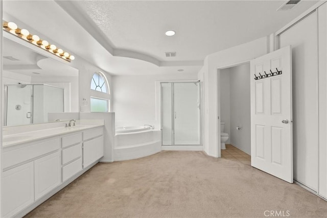 5564 Capri Ct, Palmdale, CA 93552 - bathroom with a shower stall, carpet flooring, a garden tub, vanity, and toilet