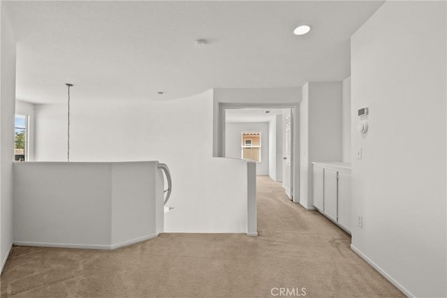 5564 Capri Ct, Palmdale, CA 93552 - corridor with light carpet and baseboards