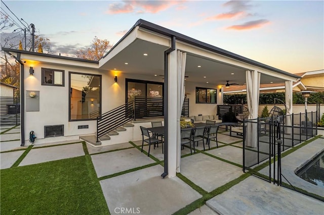 2048 W Kenneth Rd, Glendale, CA 91201 - rear view of house featuring stucco siding, a patio, ceiling fan, and fence