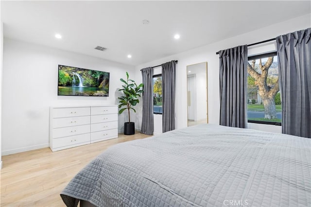 2048 W Kenneth Rd, Glendale, CA 91201 - bedroom with light wood-type flooring, recessed lighting, and baseboards