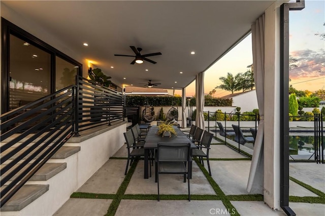 2048 W Kenneth Rd, Glendale, CA 91201 - patio terrace at dusk with ceiling fan and outdoor dining area