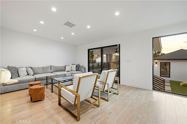 2048 W Kenneth Rd, Glendale, CA 91201 - living room with recessed lighting, light wood-style flooring, and baseboards