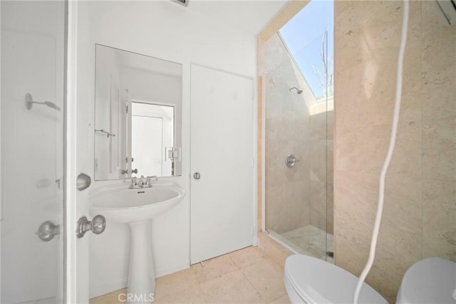 9314 Stevens Way, West Hills, CA 91304 - bathroom featuring toilet, a stall shower, a sink, and tile patterned floors