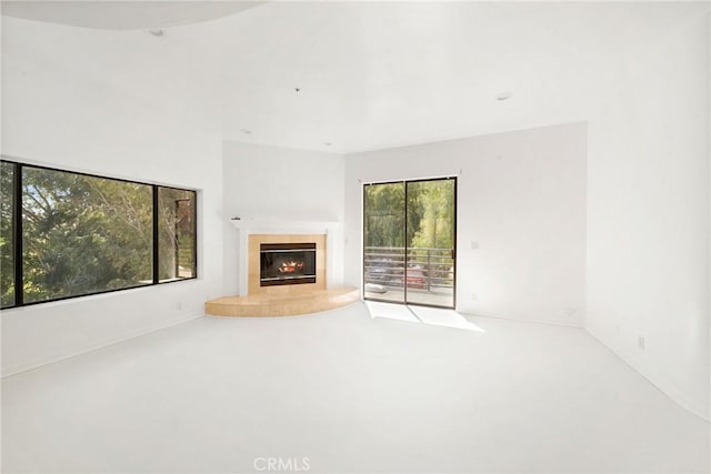 9314 Stevens Way, West Hills, CA 91304 - unfurnished living room featuring a tile fireplace and carpet flooring