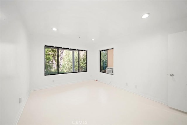 9314 Stevens Way, West Hills, CA 91304 - empty room featuring recessed lighting, healthy amount of natural light, baseboards, and cooling unit