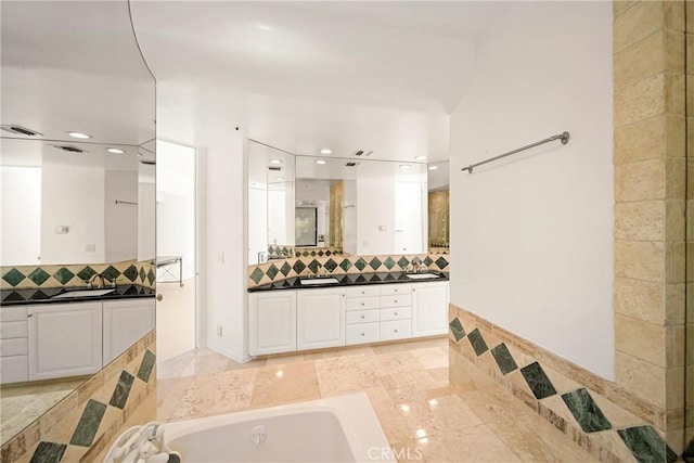 9314 Stevens Way, West Hills, CA 91304 - bathroom with backsplash, recessed lighting, a tub to relax in, and vanity