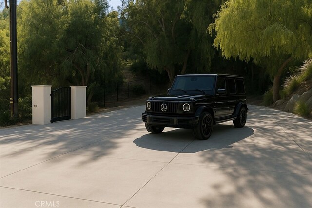 9314 Stevens Way, West Hills, CA 91304 - view of concrete surface with a gate