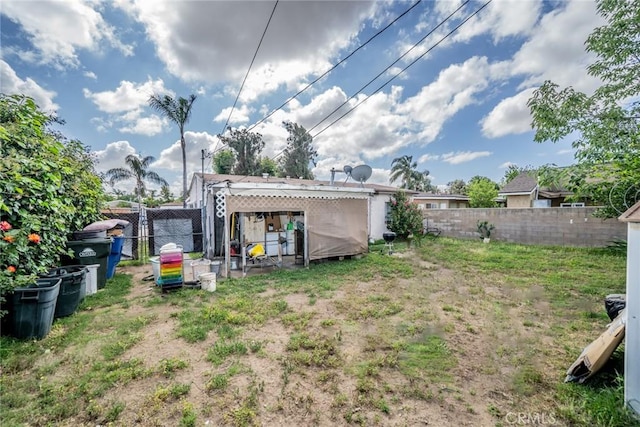 1544 S Pleasant Ave, Ontario, CA 91761 - fenced backyard with an outdoor structure and exterior structure