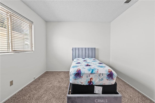 2210 El Rancho Cir, Hemet, CA 92545 - carpeted bedroom featuring a textured ceiling and baseboards