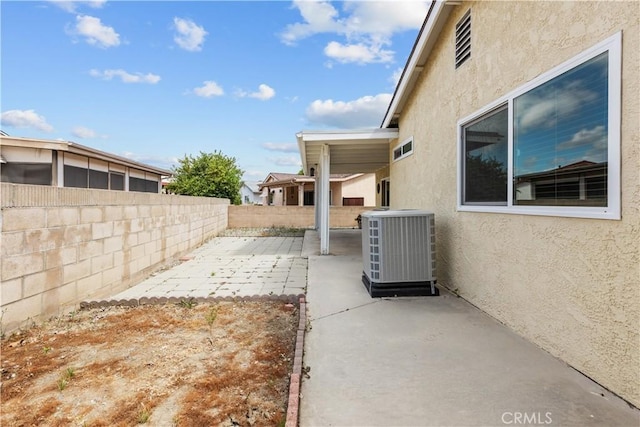 2210 El Rancho Cir, Hemet, CA 92545 - fenced backyard featuring a patio area and central AC unit