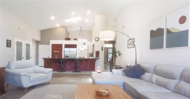 715 Windsong Ln, Nipomo, CA 93444 - living room with wood finished floors and high vaulted ceiling