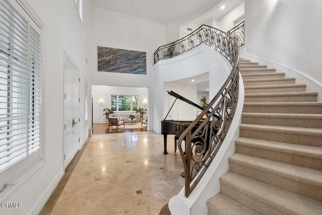12986 Macdonald Dr, Ojai, CA 93023 - foyer entrance with a high ceiling, stairway, and baseboards