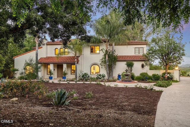 12986 Macdonald Dr, Ojai, CA 93023 - mediterranean / spanish-style home featuring a tile roof and stucco siding