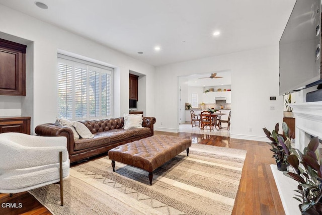 12986 Macdonald Dr, Ojai, CA 93023 - living area with a fireplace with flush hearth, baseboards, hardwood / wood-style floors, recessed lighting, and ceiling fan