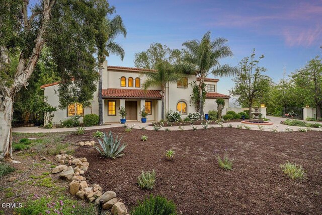12986 Macdonald Dr, Ojai, CA 93023 - mediterranean / spanish house featuring a tile roof and stucco siding
