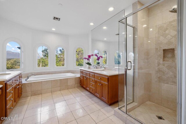 12986 Macdonald Dr, Ojai, CA 93023 - full bath with vanity, a stall shower, a bath, and recessed lighting