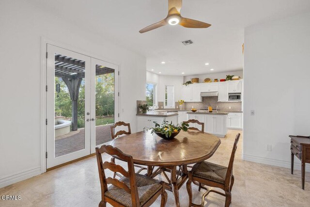 12986 Macdonald Dr, Ojai, CA 93023 - dining area featuring french doors, a ceiling fan, recessed lighting, and baseboards