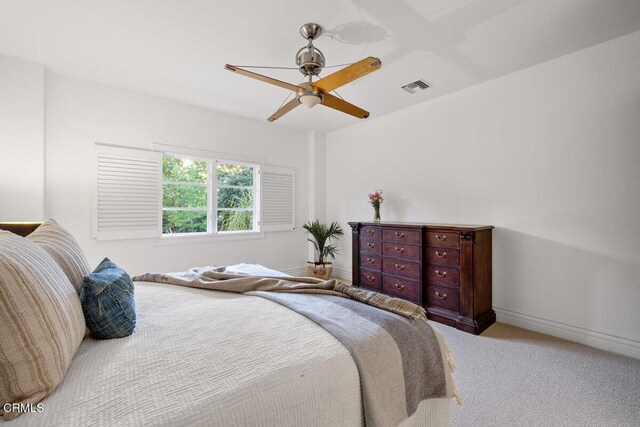 12986 Macdonald Dr, Ojai, CA 93023 - bedroom with carpet, baseboards, and ceiling fan