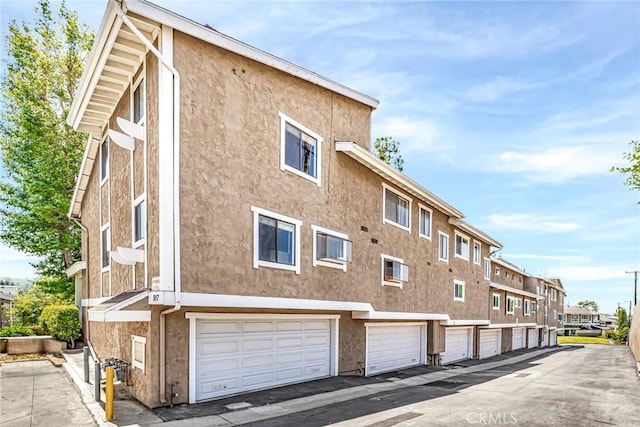 917 W Imperial Unit 64, La Habra, CA 90631 - view of property featuring a residential view and an attached garage