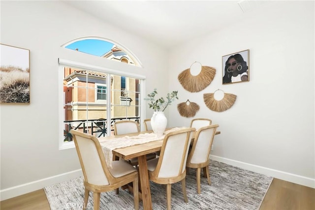 21 Medici Aisle, Irvine, CA 92606 - dining room featuring baseboards and wood finished floors