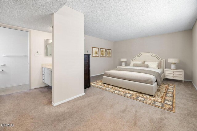 203 E Garden Grn, Port Hueneme, CA 93041 - carpeted bedroom featuring a textured ceiling and baseboards