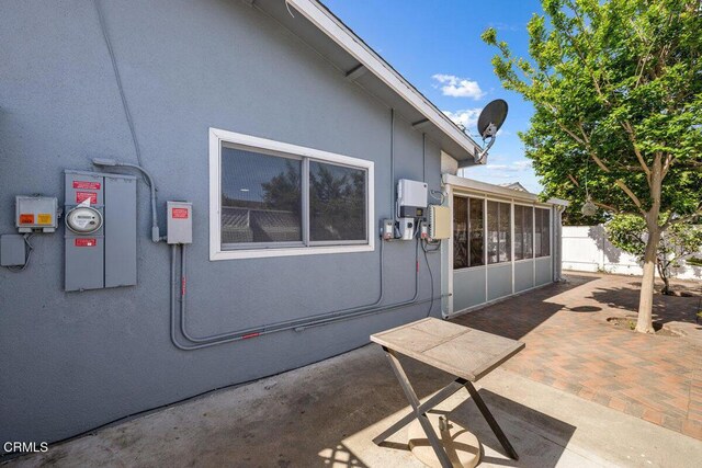 203 E Garden Grn, Port Hueneme, CA 93041 - view of patio featuring fence and a sunroom