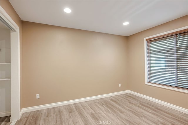 10290 Tujunga Canyon Blvd Unit 102, Tujunga, CA 91402 - empty room featuring light wood finished floors, baseboards, and recessed lighting