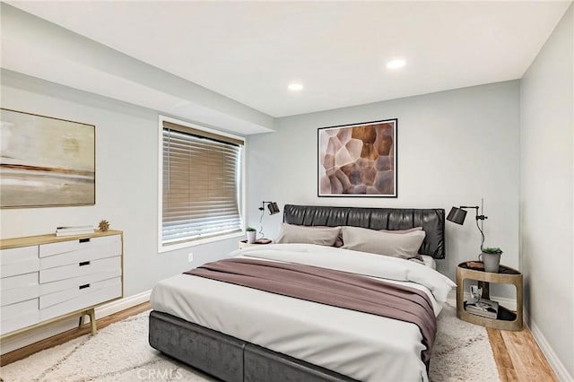 10290 Tujunga Canyon Blvd Unit 102, Tujunga, CA 91402 - bedroom with wood finished floors, baseboards, and recessed lighting