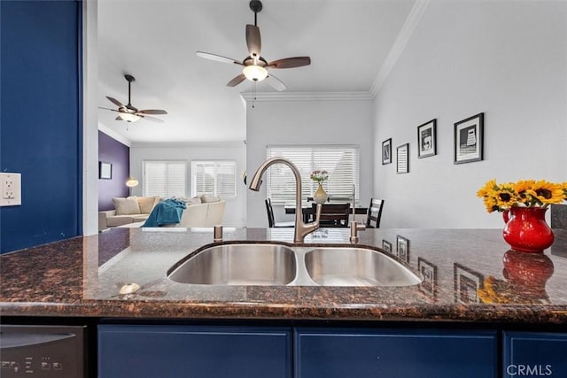 3936 W 5th St Unit 44, Santa Ana, CA 92703 - kitchen with a sink, ornamental molding, a ceiling fan, blue cabinets, and dark stone countertops