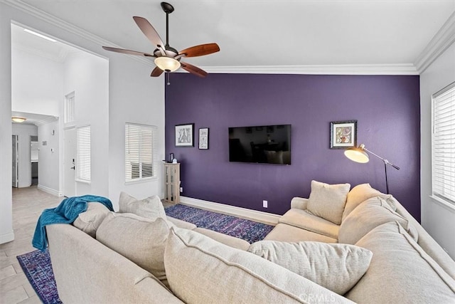 3936 W 5th St Unit 44, Santa Ana, CA 92703 - living room featuring an accent wall, ornamental molding, baseboards, ceiling fan, and lofted ceiling