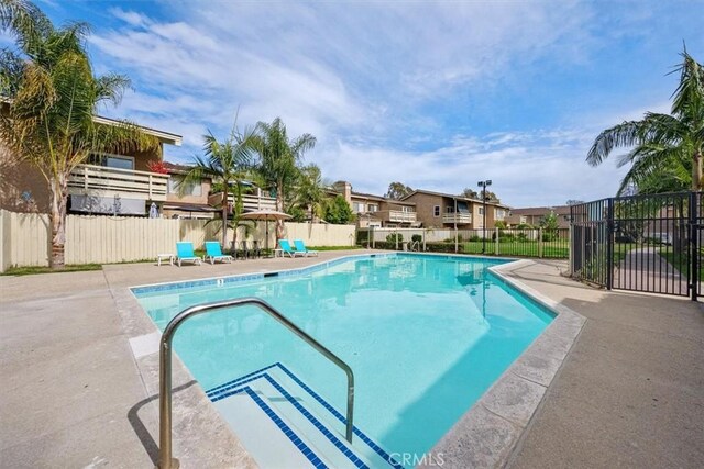 3936 W 5th St Unit 44, Santa Ana, CA 92703 - community pool featuring a patio area and fence