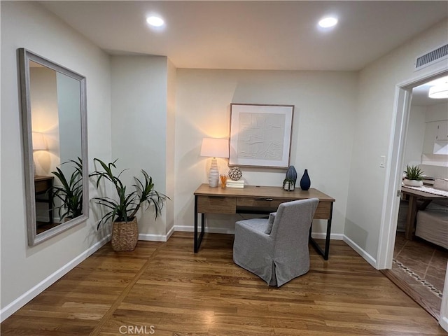 office with wood finished floors, recessed lighting, and baseboards