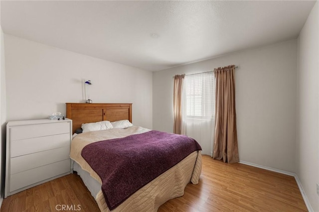 23838 Spring Branch Ct, Murrieta, CA 92562 - bedroom with light wood-type flooring and baseboards