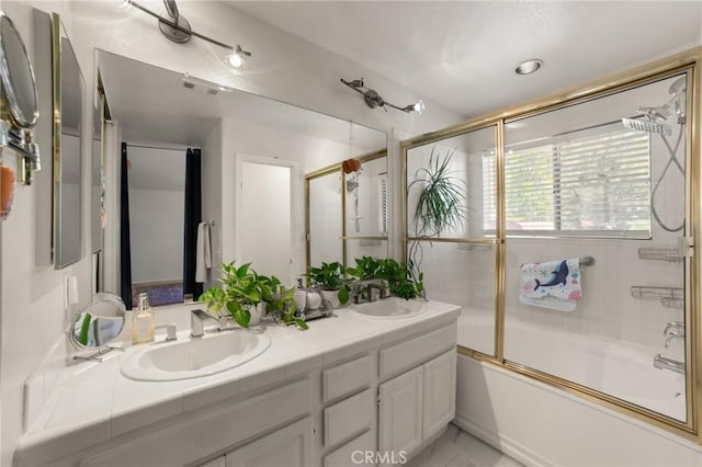 23838 Spring Branch Ct, Murrieta, CA 92562 - full bath featuring double vanity, combined bath / shower with glass door, and marble look tiles