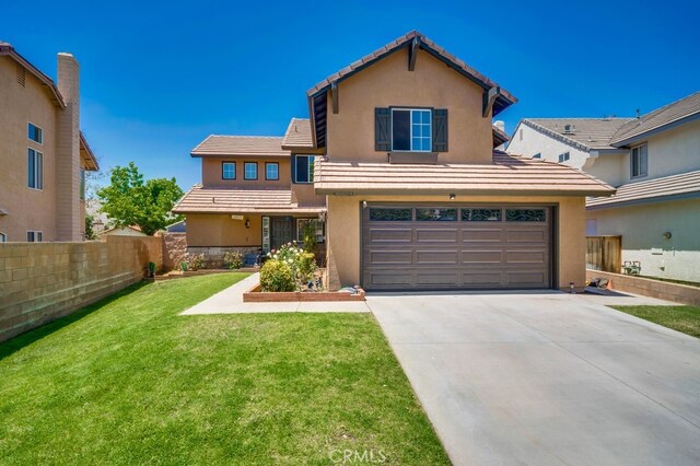 10025 Thornbird Ct, Moreno Valley, CA 92557 - view of front of home featuring stucco siding, driveway, an attached garage, and a tiled roof