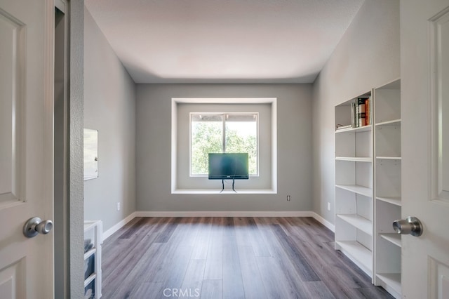 10025 Thornbird Ct, Moreno Valley, CA 92557 - spare room featuring wood finished floors and baseboards