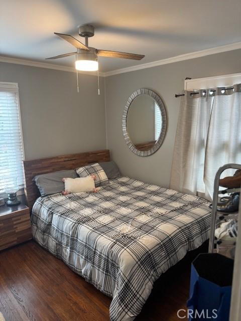 807 N Pearl Ave, Compton, CA 90221 - bedroom featuring wood finished floors, crown molding, and a ceiling fan