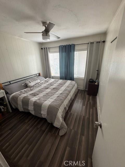 807 N Pearl Ave, Compton, CA 90221 - bedroom with dark wood-type flooring, ceiling fan, and baseboards