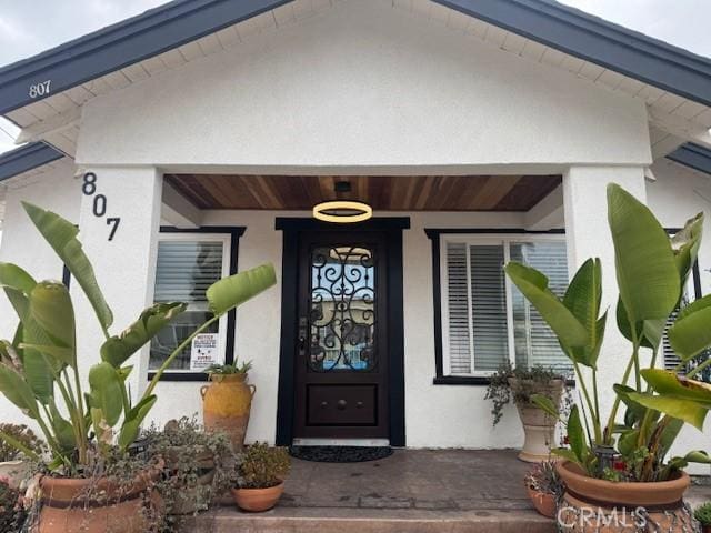 807 N Pearl Ave, Compton, CA 90221 - property entrance with stucco siding and covered porch