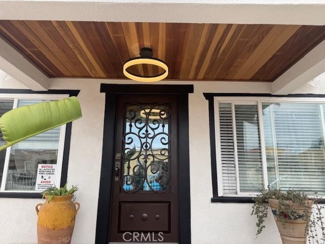 807 N Pearl Ave, Compton, CA 90221 - view of exterior entry with stucco siding