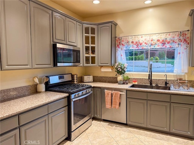 8921 Deer Trl, Frazier Park, CA 93225 - kitchen with stainless steel appliances, a sink, gray cabinets, light tile patterned flooring, and recessed lighting