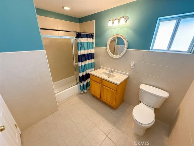 8921 Deer Trl, Frazier Park, CA 93225 - full bath featuring tile walls, toilet, wainscoting, tile patterned floors, and vanity