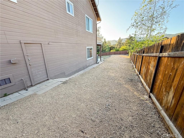 8921 Deer Trl, Frazier Park, CA 93225 - view of side of home featuring a fenced backyard