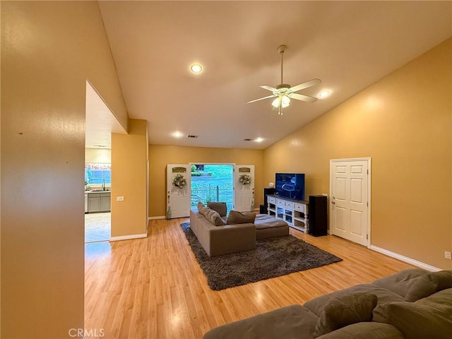8921 Deer Trl, Frazier Park, CA 93225 - living room with a ceiling fan, high vaulted ceiling, baseboards, and light wood-style flooring