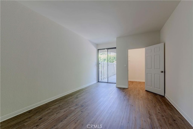 4200 Via Arbolada Unit 123, Los Angeles, CA 90042 - unfurnished room featuring dark wood-type flooring and baseboards