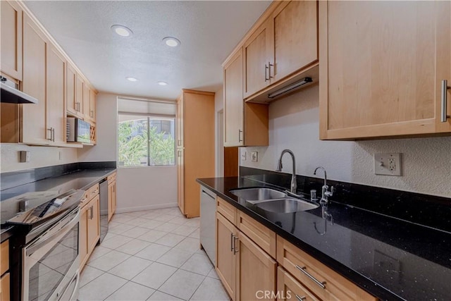 4200 Via Arbolada Unit 123, Los Angeles, CA 90042 - kitchen featuring appliances with stainless steel finishes, a sink, light brown cabinets, recessed lighting, and light tile patterned flooring