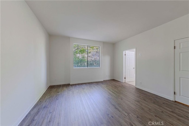 4200 Via Arbolada Unit 123, Los Angeles, CA 90042 - empty room featuring wood finished floors and baseboards