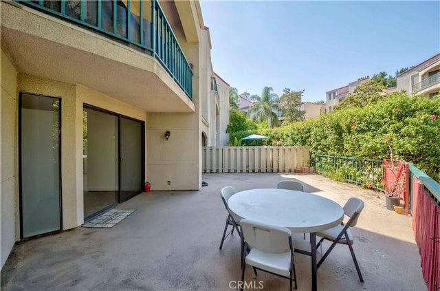 4200 Via Arbolada Unit 123, Los Angeles, CA 90042 - view of patio / terrace with fence and outdoor dining space