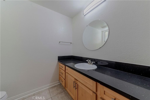 4200 Via Arbolada Unit 123, Los Angeles, CA 90042 - bathroom featuring tile patterned floors, vanity, and toilet