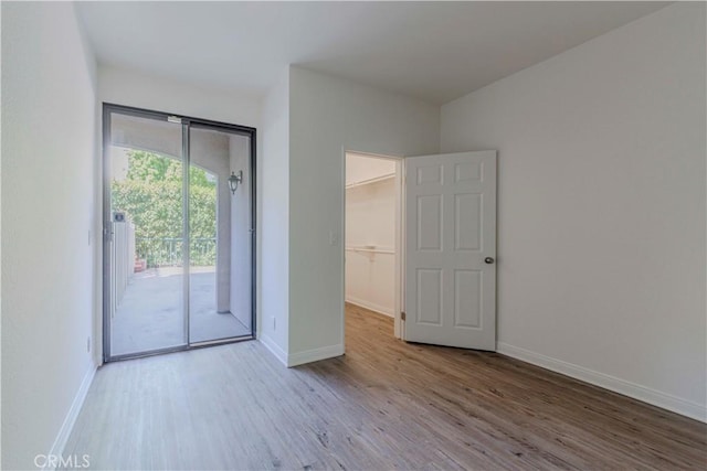 4200 Via Arbolada Unit 123, Los Angeles, CA 90042 - unfurnished room with wood finished floors and baseboards